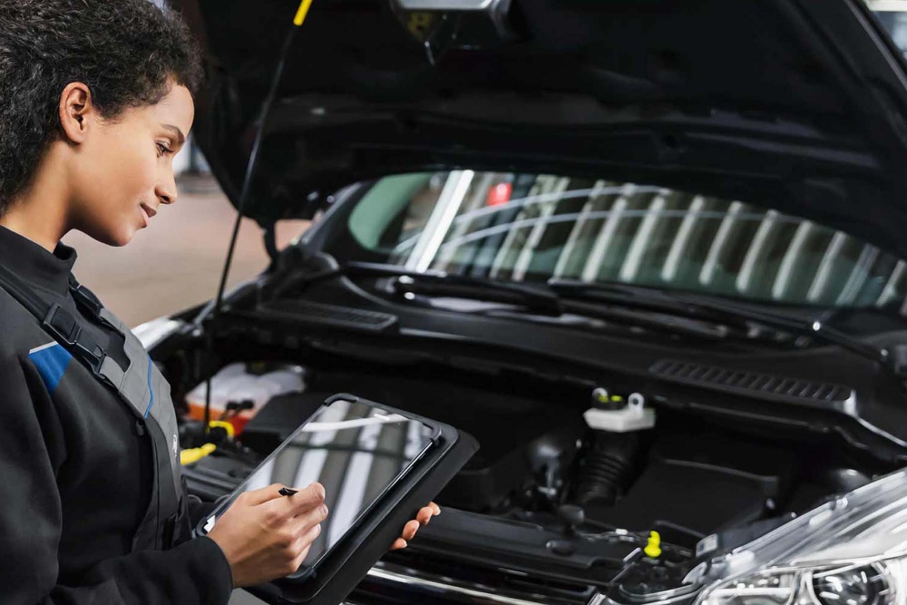 Ford apprentice collecting data