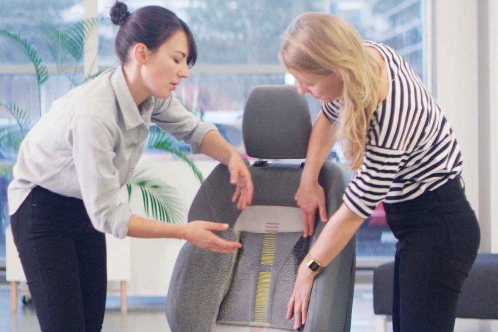 Ford interns designing a car seat