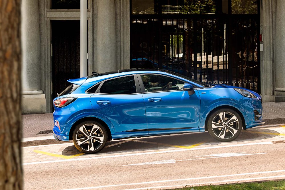 Blue Ford Puma on the road