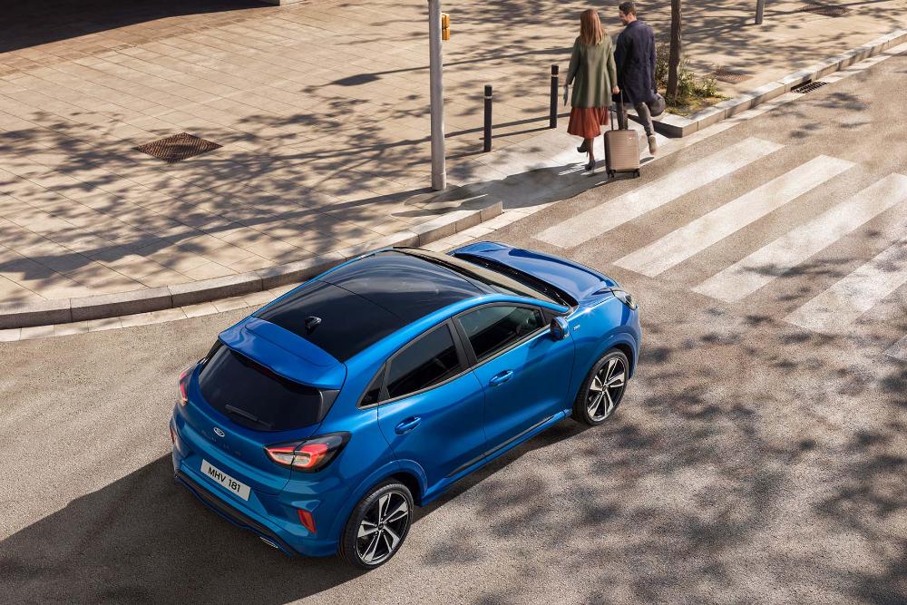 Blue Ford Puma on the road