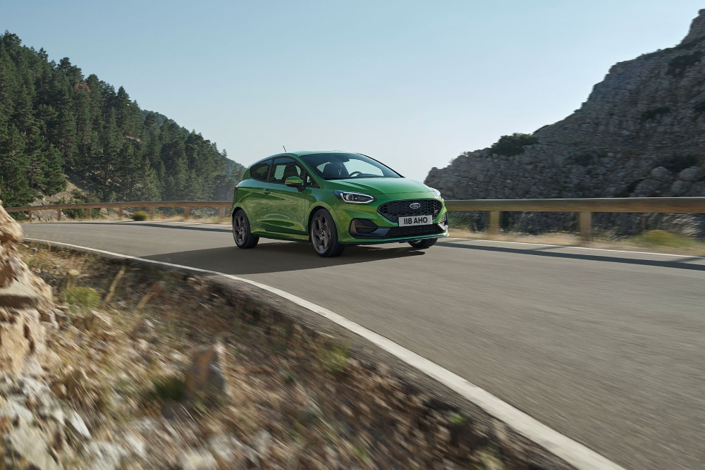 Green Ford Fiesta ST on the road