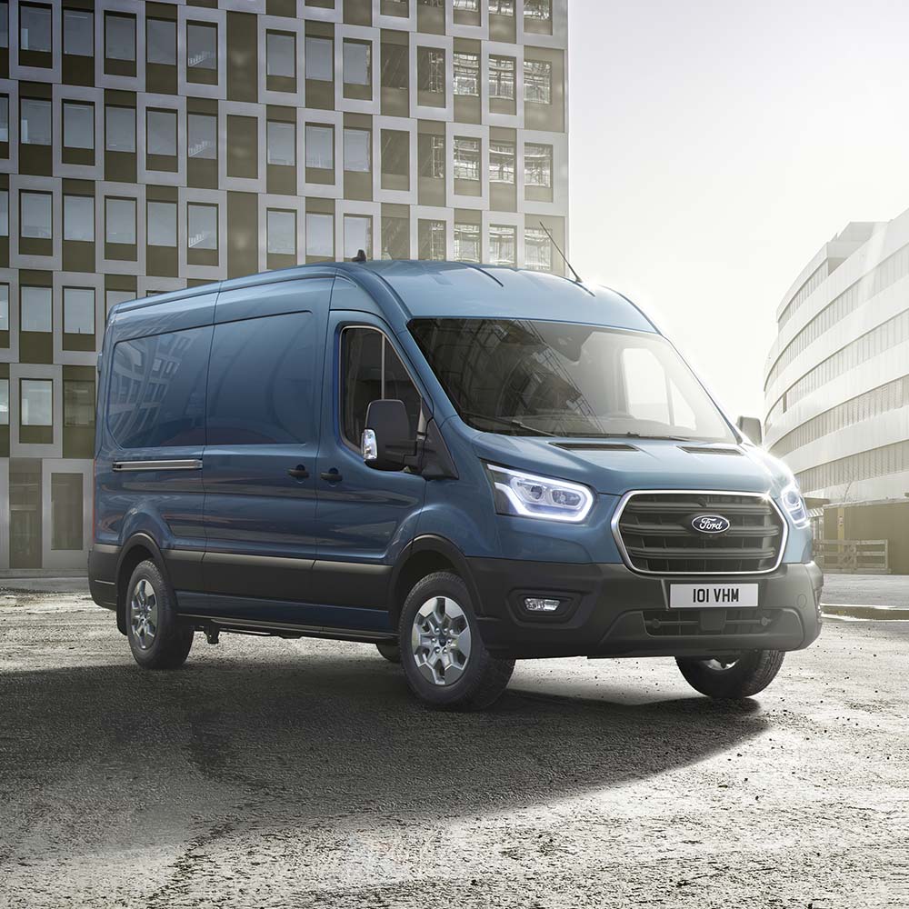 Blue Ford Transit Van, front view.