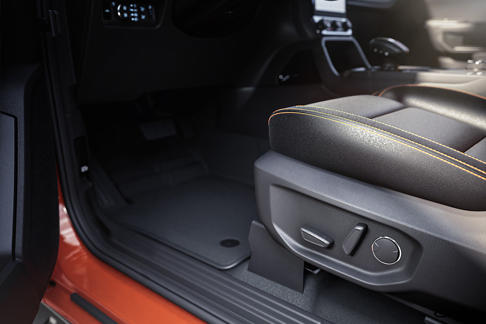 Close up view of the inside of a Ford Ranger, with a focus on the front seats.