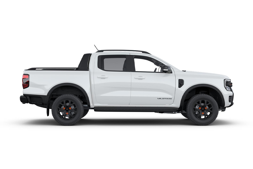 Side view of a white Ford Ranger double cab pick-up truck.
